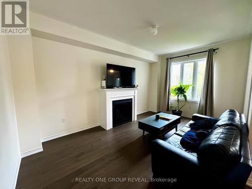 642 Lemay Grove, Peterborough, ON - Indoor Photo Showing Living Room With Fireplace