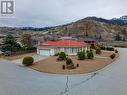 Low maintenance large corner lot with underground sprinkler - 11900 Olympic View Drive, Osoyoos, BC  - Outdoor 