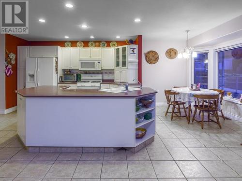 Kitchen with nook -main floor - 11900 Olympic View Drive, Osoyoos, BC - Indoor Photo Showing Kitchen With Double Sink