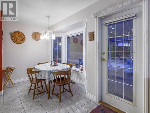 Kitchen nook & entrance to private covered patio - 11900 Olympic View Drive, Osoyoos, BC - Indoor Photo Showing Dining Room