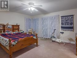 Primary bedroom with privacy entrance to covered patio - 