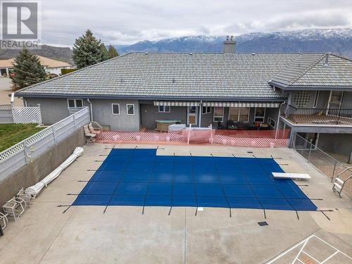 Massive yard for entertaining - Salt water pool - 11710 Olympic View Drive, Osoyoos, BC - Outdoor With In Ground Pool With Deck Patio Veranda