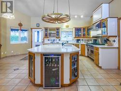 Kitchen with entrance to patio & pool - 