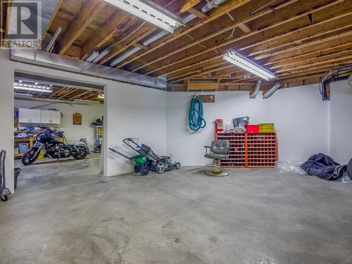 Large workshop - 11710 Olympic View Drive, Osoyoos, BC - Indoor Photo Showing Basement