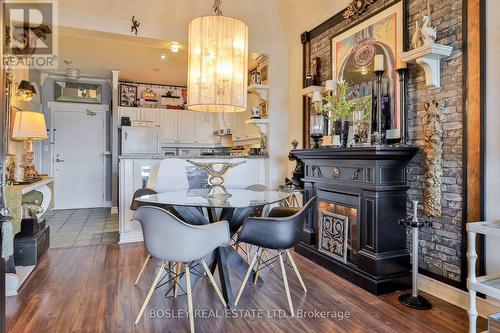 705 - 1 Leaside Park Drive, Toronto, ON - Indoor Photo Showing Dining Room With Fireplace