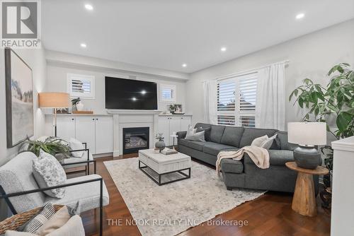 39 Colville Avenue, Clarington (Bowmanville), ON - Indoor Photo Showing Living Room With Fireplace