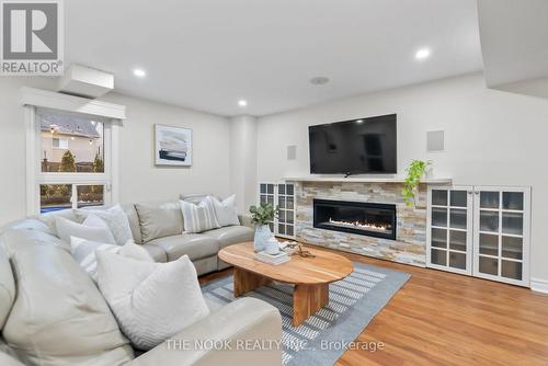 39 Colville Avenue, Clarington (Bowmanville), ON - Indoor Photo Showing Living Room With Fireplace