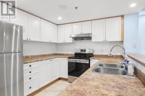 201 - 7428 Markham Road, Markham, ON - Indoor Photo Showing Kitchen With Double Sink