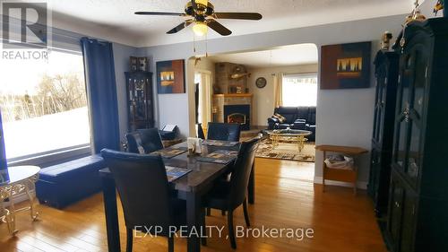 43 Gyles Point Road, Parry Sound, Unorganized District, ON - Indoor Photo Showing Dining Room With Fireplace