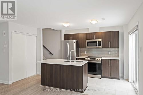 B - 713 Amberwing Private, Ottawa, ON - Indoor Photo Showing Kitchen With Double Sink With Upgraded Kitchen