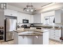 Large bright Kitchen with island and 9ft ceilings - 615 Sutherland Avenue, Kelowna, BC  - Indoor 