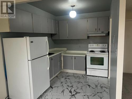 201 - 51 Russett Avenue, Oshawa, ON - Indoor Photo Showing Kitchen