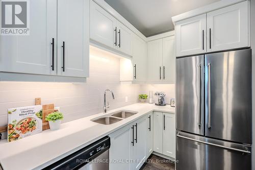 312 - 332 Gosling Gardens, Guelph (Guelph South), ON - Indoor Photo Showing Kitchen With Stainless Steel Kitchen With Double Sink With Upgraded Kitchen