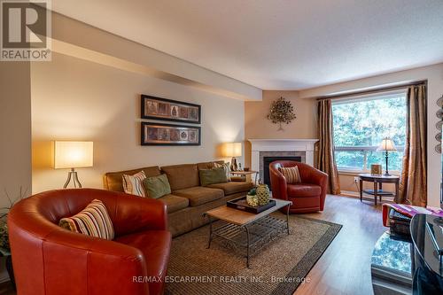 19 - 2155 Duncaster Drive, Burlington, ON - Indoor Photo Showing Living Room With Fireplace