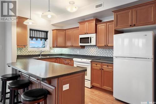 310 102 Armistice Way, Saskatoon, SK - Indoor Photo Showing Kitchen With Double Sink