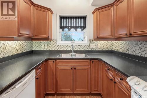 310 102 Armistice Way, Saskatoon, SK - Indoor Photo Showing Kitchen With Double Sink