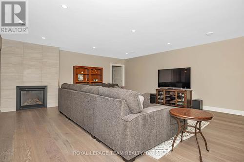 700 Mcmanus Avenue, Ottawa, ON - Indoor Photo Showing Living Room With Fireplace