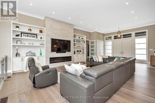 700 Mcmanus Avenue, Ottawa, ON - Indoor Photo Showing Living Room With Fireplace