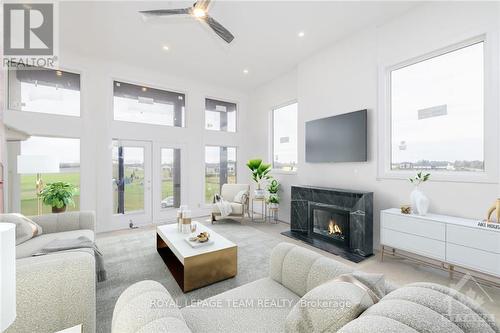 6840 Still Meadow Way, Ottawa, ON - Indoor Photo Showing Living Room With Fireplace