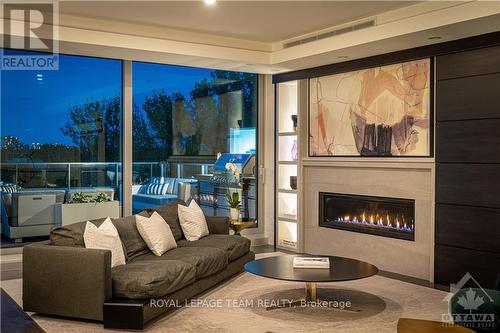 301 - 364 Queen Elizabeth Drive, Ottawa, ON - Indoor Photo Showing Living Room With Fireplace