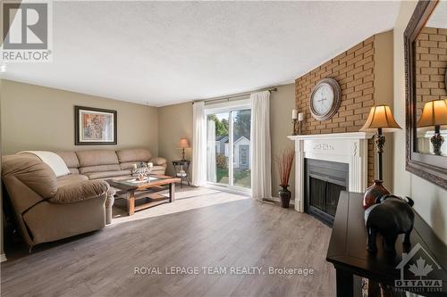 368 Duval Lane, Ottawa, ON - Indoor Photo Showing Living Room With Fireplace