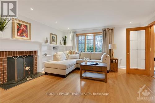 19 Farnham Crescent, Ottawa, ON - Indoor Photo Showing Living Room With Fireplace