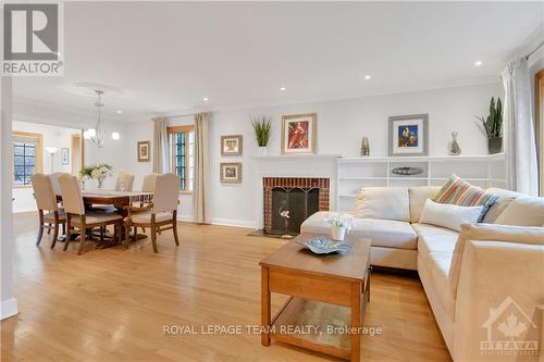 19 Farnham Crescent, Ottawa, ON - Indoor Photo Showing Living Room With Fireplace