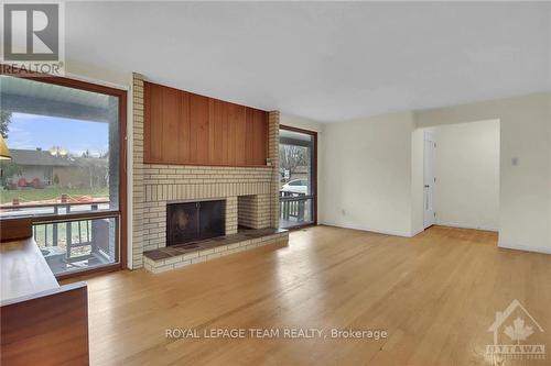 44 Ashgrove Crescent, Ottawa, ON - Indoor Photo Showing Living Room With Fireplace