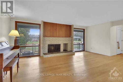 44 Ashgrove Crescent, Ottawa, ON - Indoor Photo Showing Living Room With Fireplace