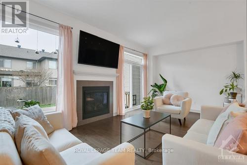 308 Rainrock Crescent, Ottawa, ON - Indoor Photo Showing Living Room With Fireplace