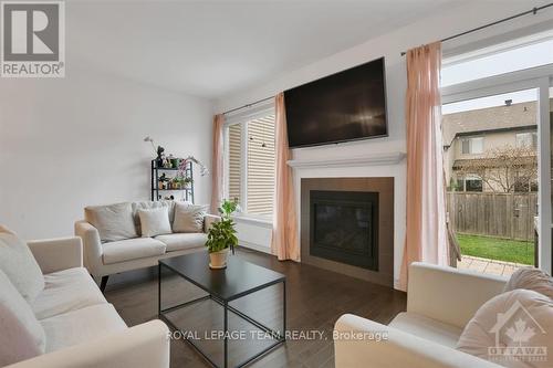 308 Rainrock Crescent, Ottawa, ON - Indoor Photo Showing Living Room With Fireplace