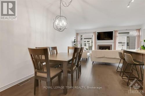 308 Rainrock Crescent, Ottawa, ON - Indoor Photo Showing Dining Room With Fireplace