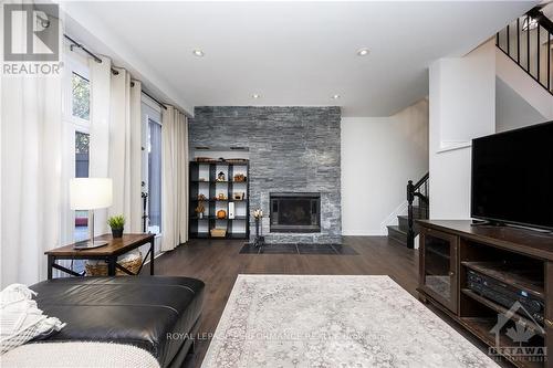 52 Reaney Court, Ottawa, ON - Indoor Photo Showing Living Room With Fireplace