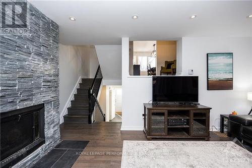 52 Reaney Court, Ottawa, ON - Indoor Photo Showing Living Room With Fireplace