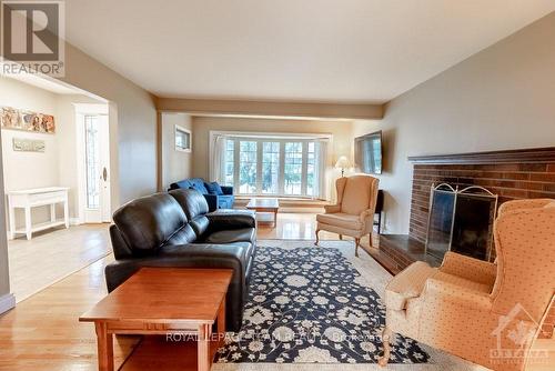 73 Aero Drive, Ottawa, ON - Indoor Photo Showing Living Room With Fireplace