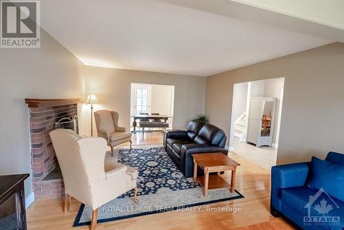 73 Aero Drive, Ottawa, ON - Indoor Photo Showing Living Room With Fireplace