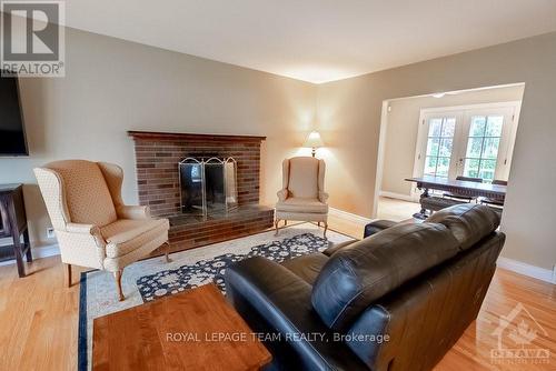 73 Aero Drive, Ottawa, ON - Indoor Photo Showing Living Room With Fireplace