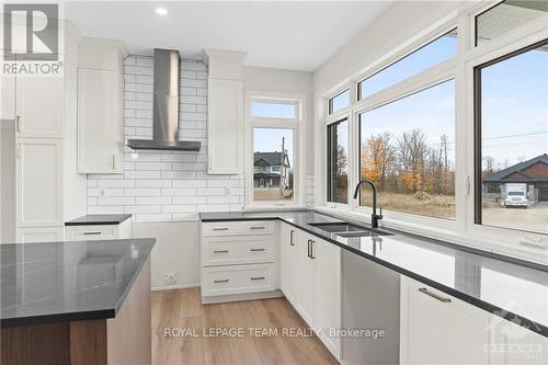 70 Tennant Drive, Rideau Lakes, ON - Indoor Photo Showing Kitchen With Double Sink With Upgraded Kitchen