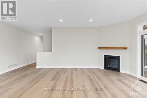 70 Tennant Drive, Rideau Lakes, ON - Indoor Photo Showing Living Room With Fireplace