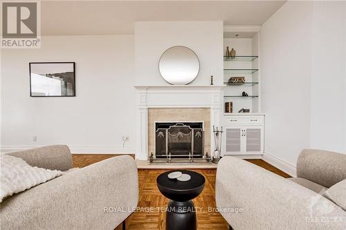 1201 - 40 Boteler Street, Ottawa, ON - Indoor Photo Showing Living Room With Fireplace