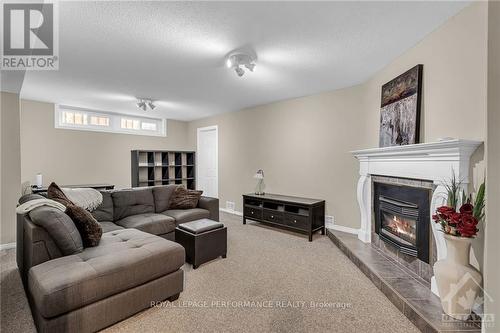 1616 Charbonneau Street, Ottawa, ON - Indoor Photo Showing Living Room With Fireplace