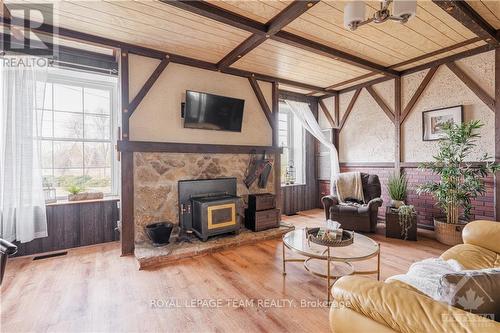 23 Blacksmith Road, Rideau Lakes, ON - Indoor Photo Showing Living Room With Fireplace