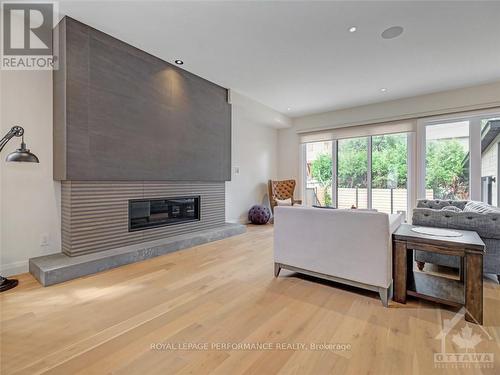 145 Mulvihill Avenue, Ottawa, ON - Indoor Photo Showing Living Room With Fireplace