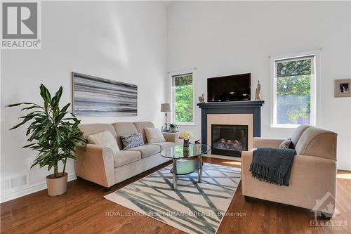 518 Golden Sedge Way, Ottawa, ON - Indoor Photo Showing Living Room With Fireplace