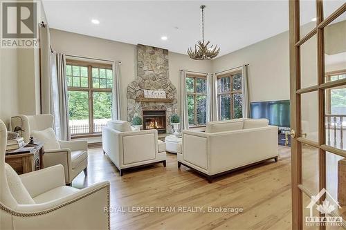 1465 Squire Drive, Ottawa, ON - Indoor Photo Showing Living Room With Fireplace