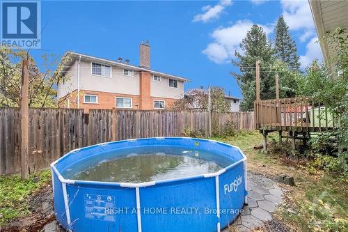 917 Pinecrest Road, Ottawa, ON - Outdoor With Above Ground Pool With Backyard