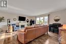 424 Hyndman Road, Edwardsburgh/Cardinal, ON  - Indoor Photo Showing Living Room With Fireplace 