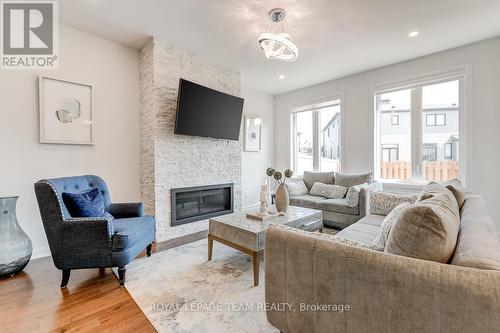 218 Calvington Avenue, Ottawa, ON - Indoor Photo Showing Living Room With Fireplace