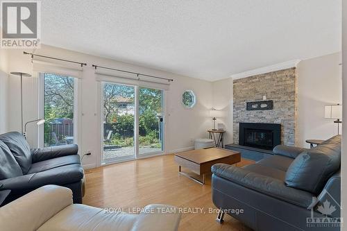 1132 Sugarbush Court, Ottawa, ON - Indoor Photo Showing Living Room With Fireplace