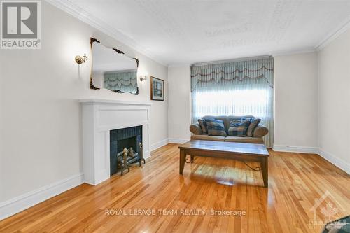 128&130 Bayswater Avenue, Ottawa, ON - Indoor Photo Showing Living Room With Fireplace